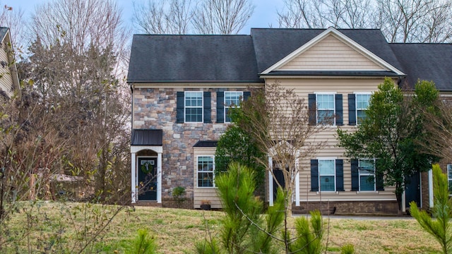 view of front of home with a front lawn