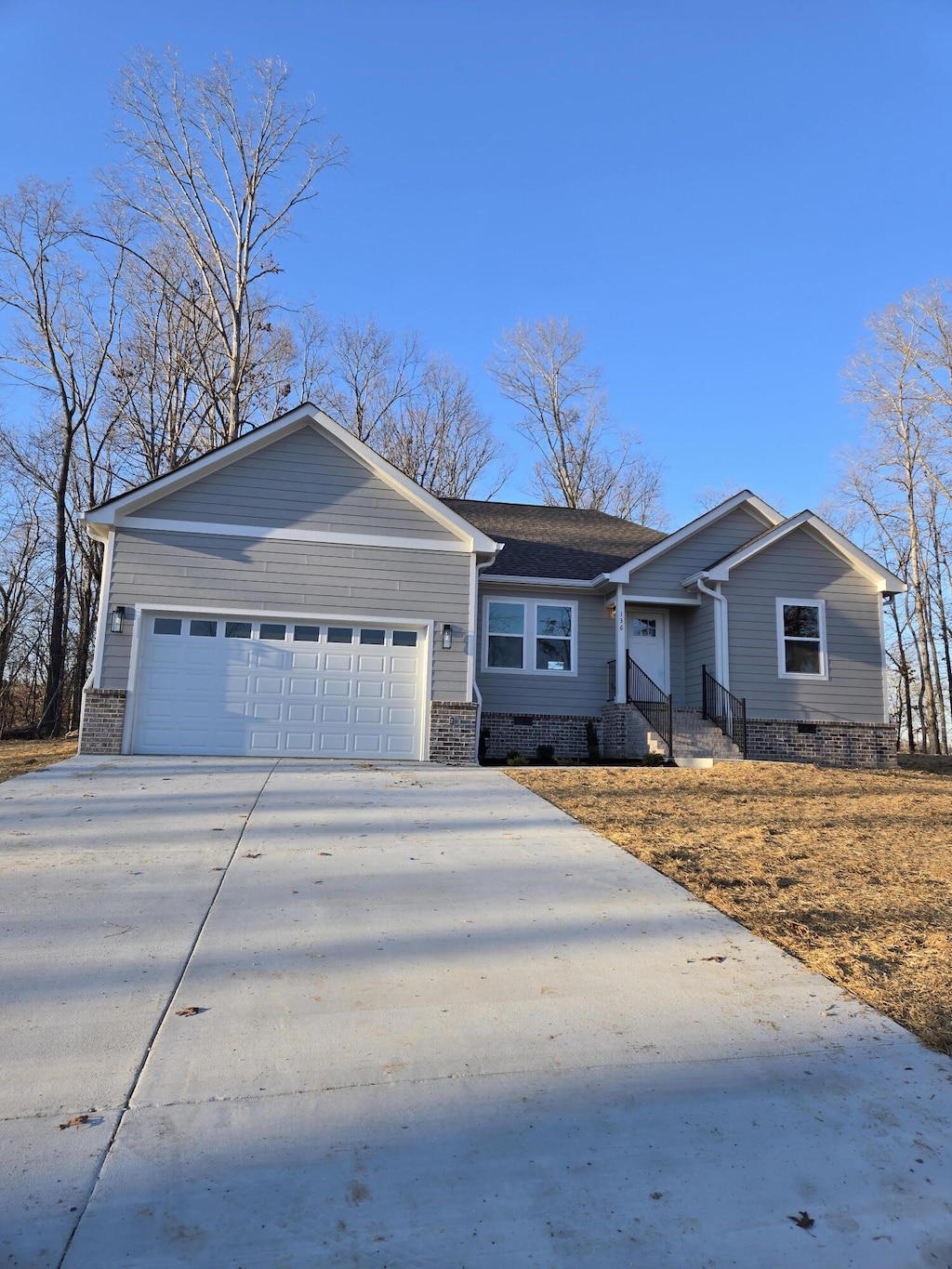 ranch-style home with a garage