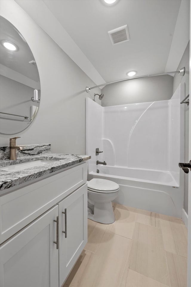 full bathroom with tile patterned floors, vanity, toilet, and shower / bathtub combination