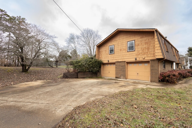 view of home's exterior with a garage