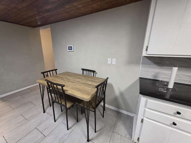 1568 Perry St SE, Cleveland, TN 37311 - dining space featuring wood ceiling, baseboards, and light wood-type flooring