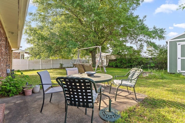 250 Rocky Ford Rd, Rossville, GA 30741 - view of patio / terrace featuring a shed, outdoor dining space, and an outdoor structure
