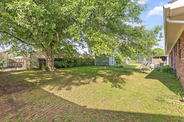 250 Rocky Ford Rd, Rossville, GA 30741 - view of yard featuring an outdoor structure and a storage unit
