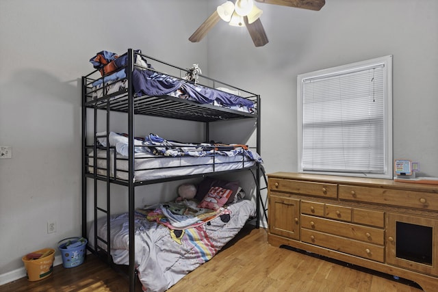 bedroom featuring ceiling fan and light wood-type flooring