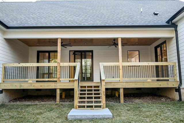 wooden deck featuring ceiling fan