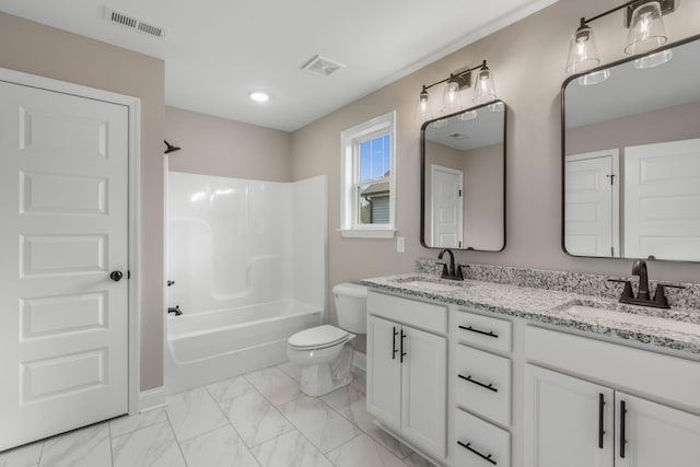 full bathroom featuring vanity, toilet, and bathtub / shower combination