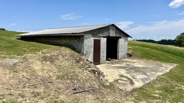 view of outdoor structure featuring a rural view