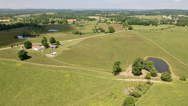 bird's eye view with a rural view and a water view