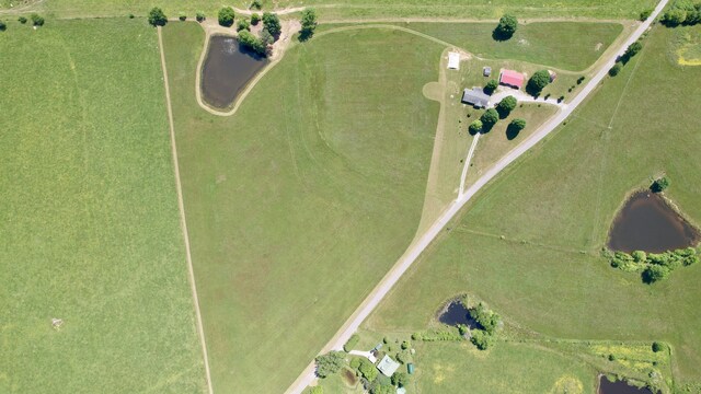 bird's eye view featuring a water view and a rural view