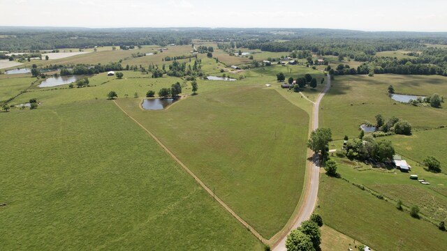 bird's eye view featuring a rural view and a water view