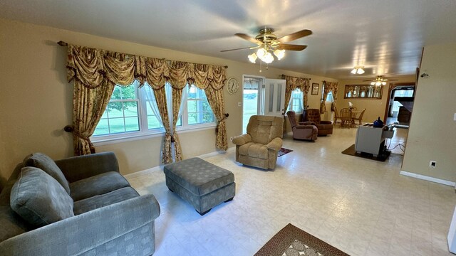 living room featuring ceiling fan