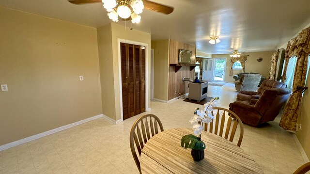 dining space featuring ceiling fan