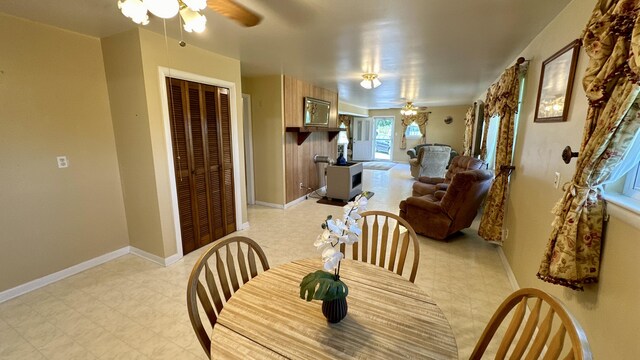 dining area with ceiling fan