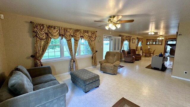 living room with ceiling fan