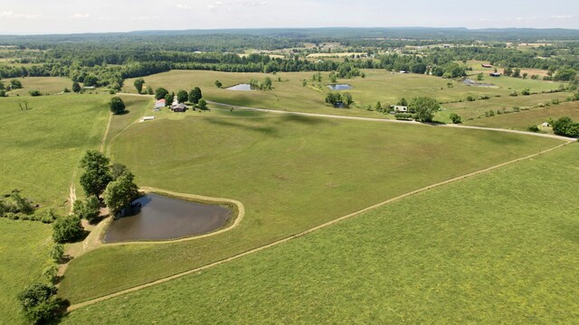 drone / aerial view with a rural view and a water view