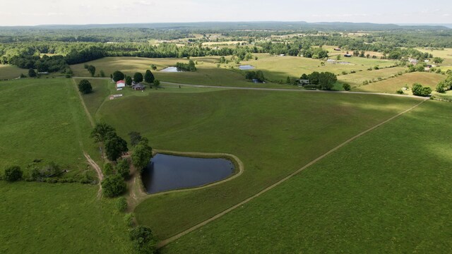 aerial view featuring a rural view and a water view