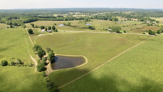 bird's eye view featuring a water view and a rural view