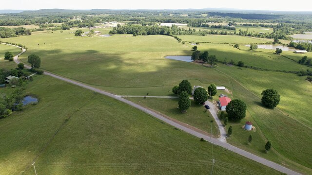 bird's eye view featuring a rural view and a water view