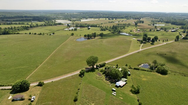 aerial view featuring a rural view and a water view