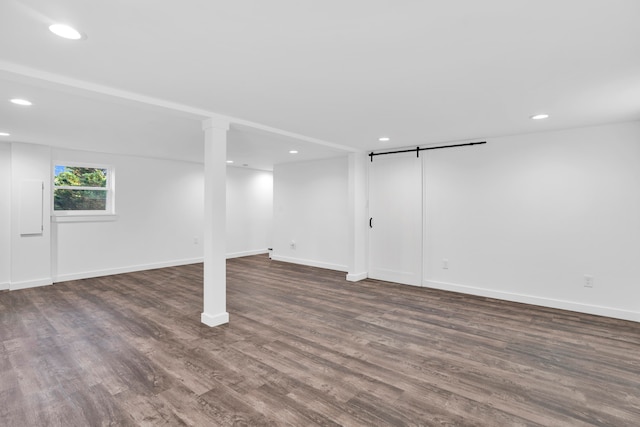 basement with dark wood-type flooring