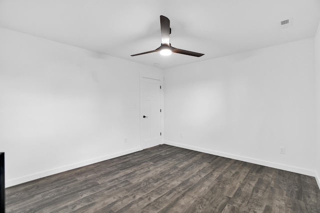 unfurnished room featuring dark hardwood / wood-style floors and ceiling fan