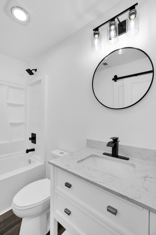 full bathroom with toilet, vanity, shower / bath combination, and hardwood / wood-style flooring