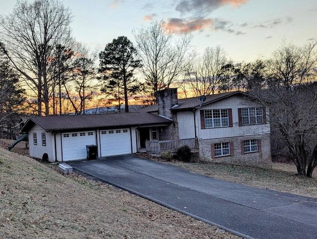 split level home with a garage