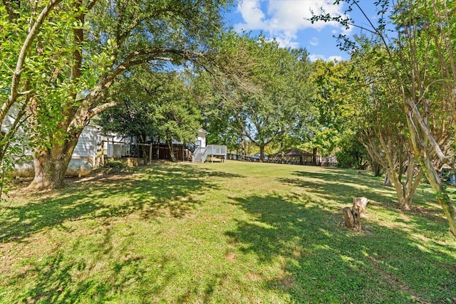 view of yard featuring a deck