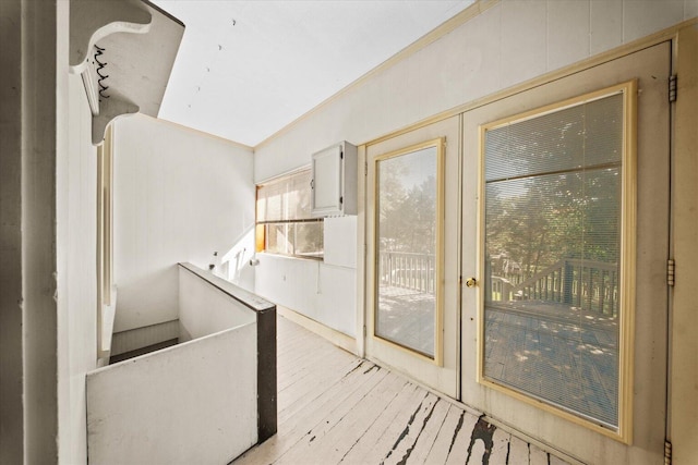 entryway featuring french doors and light wood-type flooring