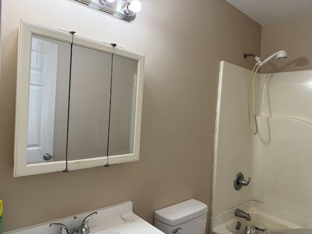 bathroom featuring  shower combination and toilet