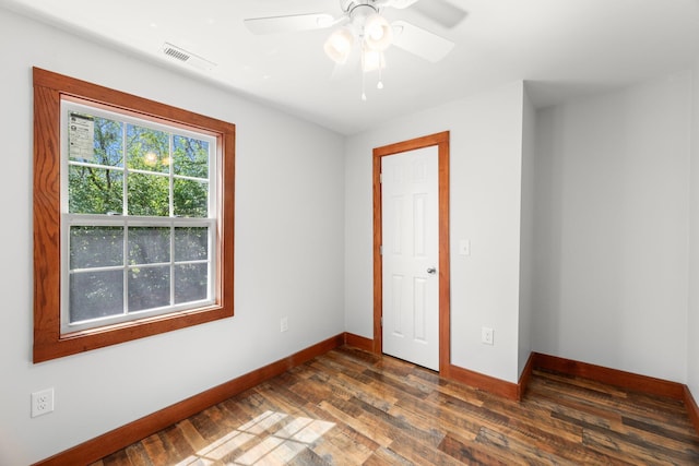 804 Eastanallee Ave, Athens, TN 37303 - unfurnished room with dark wood-style flooring, visible vents, baseboards, and ceiling fan