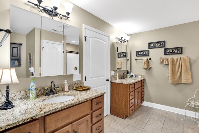 bathroom featuring vanity and tile patterned floors