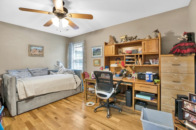 bedroom featuring ceiling fan and light wood-type flooring