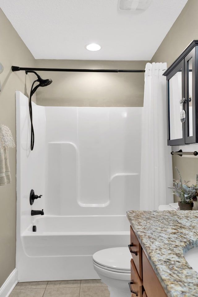 full bathroom with tile patterned floors, vanity, toilet, and shower / bath combo with shower curtain