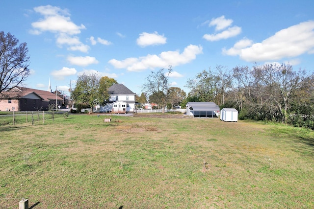 view of yard featuring a storage unit