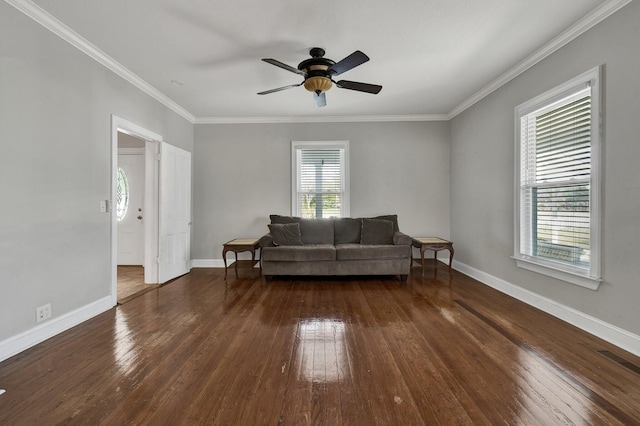 unfurnished living room with ornamental molding, a wealth of natural light, dark wood-type flooring, and ceiling fan