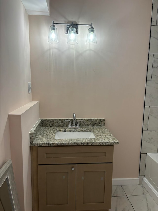 bathroom with a bathing tub and vanity