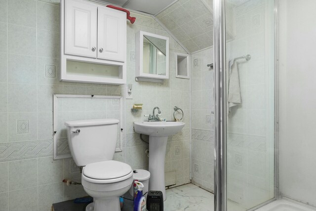 9712 Birchwood Pike, Harrison, TN 37341 - full bathroom with marble finish floor, lofted ceiling, toilet, a stall shower, and a sink