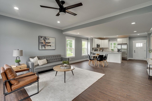 1318 Unity Dr NE, Cleveland, TN 37312 - living area with crown molding, ceiling fan, baseboards, recessed lighting, and healthy amount of natural light