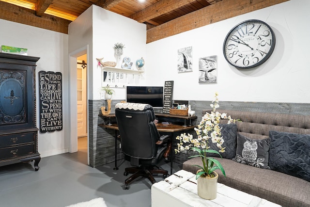 office space with concrete flooring, wood ceiling, and beam ceiling