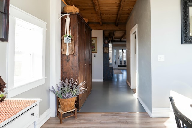 corridor with beamed ceiling and wooden ceiling