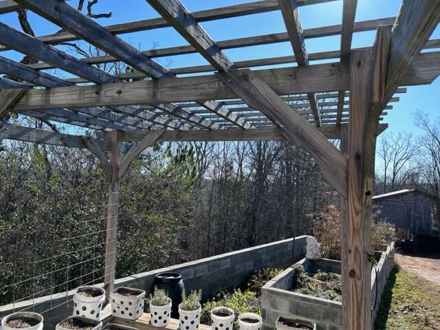 exterior space featuring a pergola