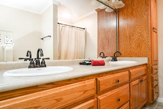 bathroom featuring vanity and crown molding