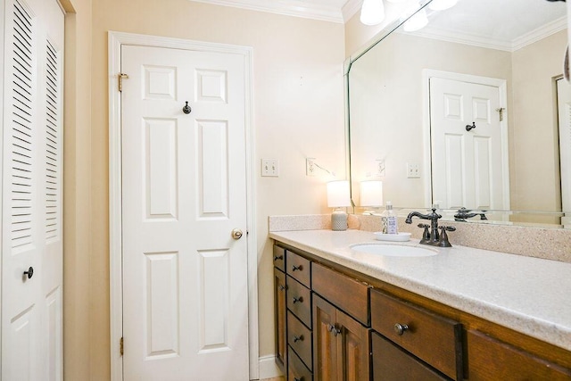 bathroom featuring vanity and crown molding