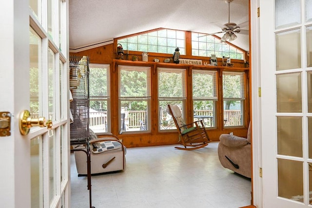 sunroom with vaulted ceiling and ceiling fan