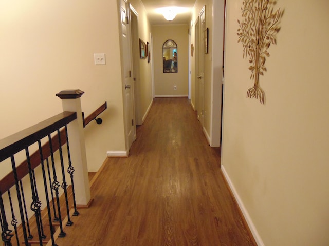 668 Mount Zion Rd NW, Georgetown, TN 37336 - corridor featuring wood finished floors, baseboards, and an upstairs landing
