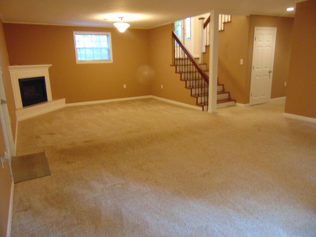 668 Mount Zion Rd NW, Georgetown, TN 37336 - basement featuring stairs, light colored carpet, and a fireplace with raised hearth