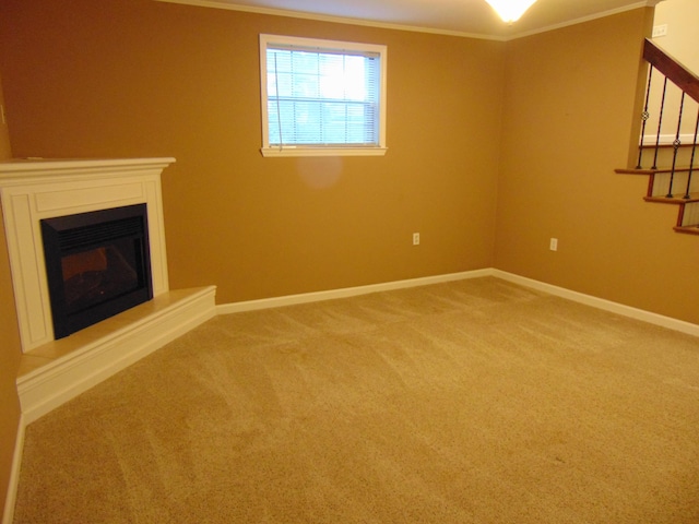 668 Mount Zion Rd NW, Georgetown, TN 37336 - unfurnished living room featuring ornamental molding, carpet, a glass covered fireplace, and stairway