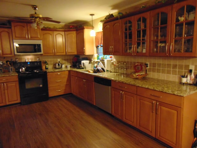668 Mount Zion Rd NW, Georgetown, TN 37336 - kitchen with black range with electric cooktop, dishwasher, a sink, decorative backsplash, and dark wood-type flooring