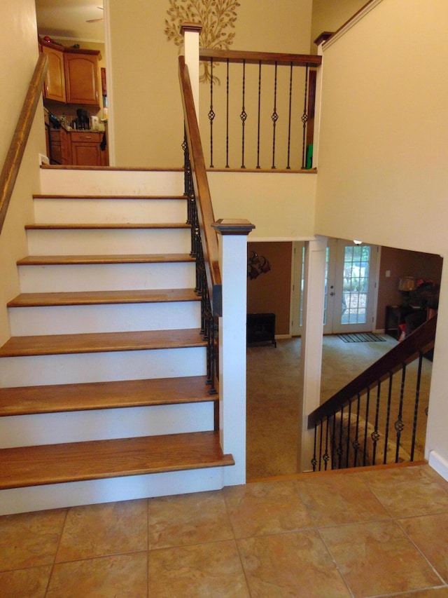 668 Mount Zion Rd NW, Georgetown, TN 37336 - stairway with tile patterned flooring and a high ceiling